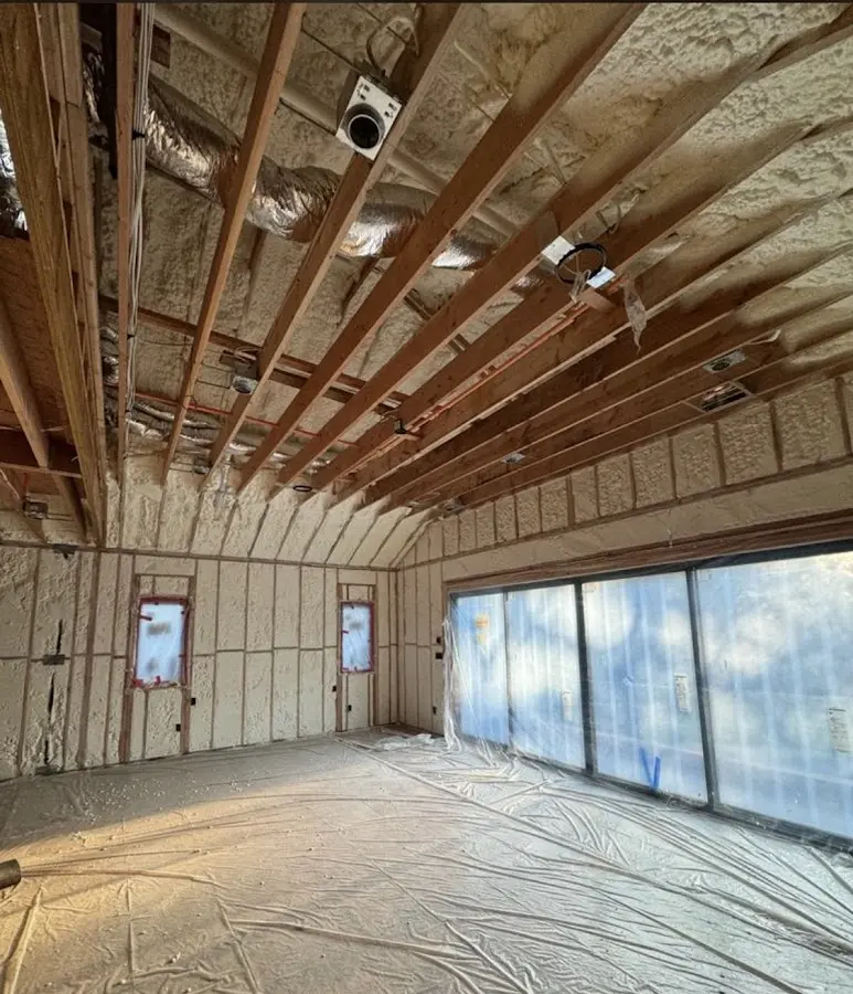 Interior walls and ceiling insulated with spray foam during new construction in Lake Alfred